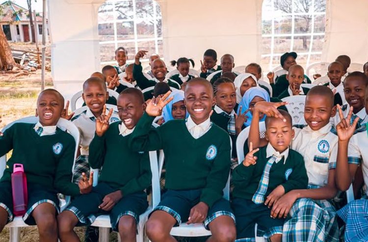 Pupils celebrating at Winners Schools